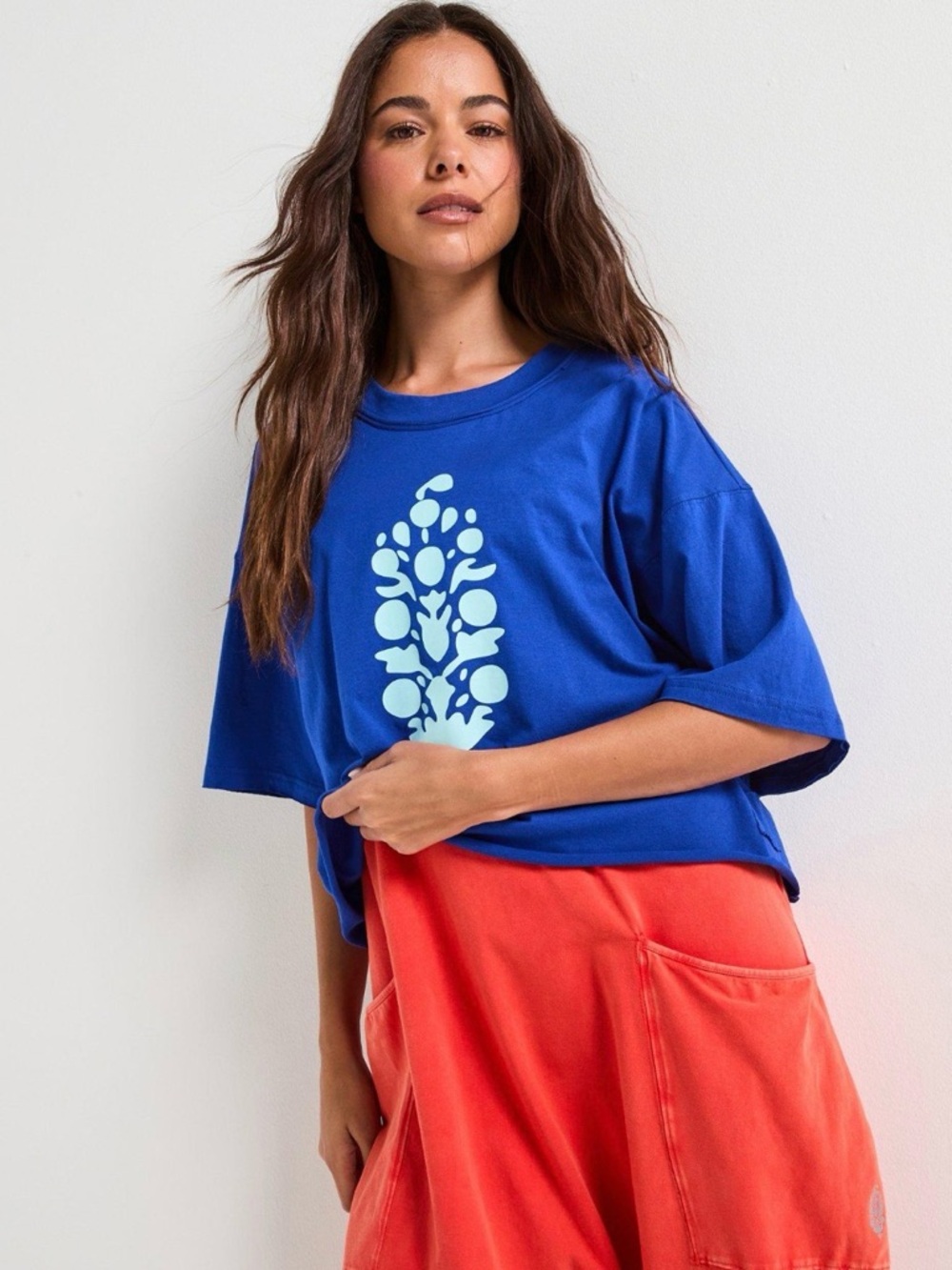 NWOT Free People Movement blue tee with graphic logo